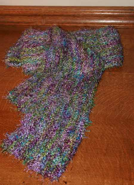 Pattern: None. Lengthwise knitted scarf. Yarn: Coming soon